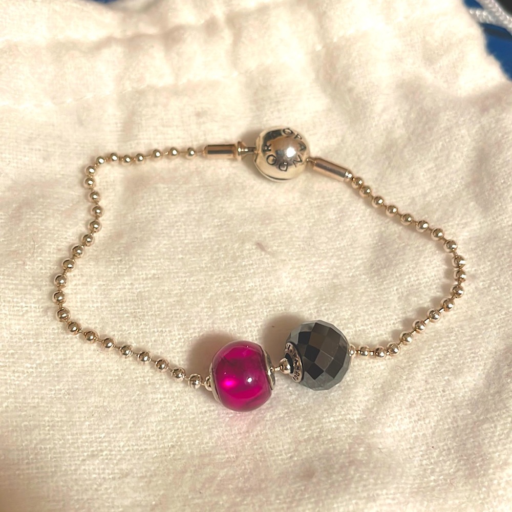 Pandora essence bracelet with beads